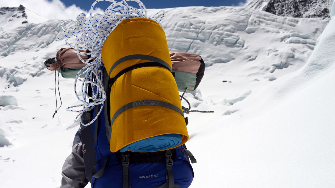 05 Climbing Sherpa Lal Singh Tamang Carries Our Equipment Through The Broken Up East Rongbuk Glacier On The Way To Lhakpa Ri Camp I 